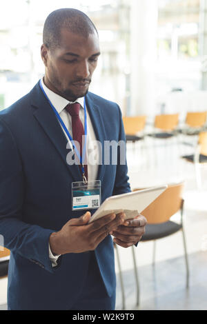 African-american businessman standing in conference room Stock Photo