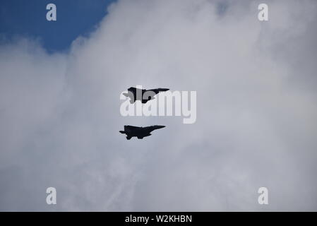 f 15 eagle jet fighter USAF flying past against a cloudy sky Stock ...