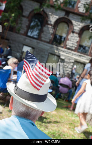 Man welcomes new citizens at  Naturalization ceremony on July 4 in Northampton MA. Stock Photo