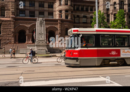 Toronto, Canada - 22 June 2019: Street car in Downtown Toronto going on College street Stock Photo