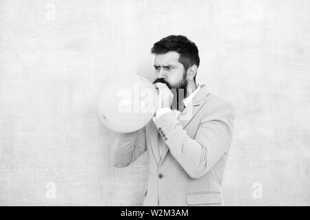 Blowing balloon man Black and White Stock Photos & Images - Alamy