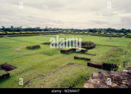 Paharpur Buddhist Monastery, a tourist attraction of North Bengal was established by King Dharma Pal in 7th century. Located in Paharpur village 5 km. west of Jamalganj in the greater Rajshahi district, this 7th century archaeological find covers approximately an area of 27 acres of land. The main temple is in the center of the Monastery. The architecture of the pyramidal cruciform temple is profoundly influenced by those of South-East Asia, especially Myanmar and Java. It is a UNESCO World Heritage site. Bangladesh. 1997. Stock Photo