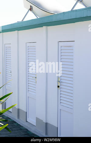 White color beach huts in Rimini beach resort, Italy Stock Photo