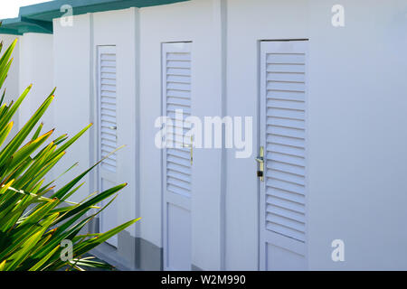 White color beach huts in Rimini beach resort, Italy Stock Photo