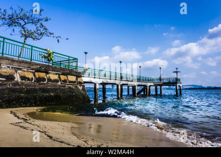 Singapore - Sept 30, 2018: Jetty and beach in front of the Beaulieu House in Sembawang Park. Stock Photo