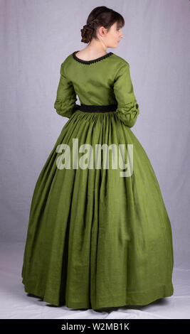 Victorian woman in green ensemble Stock Photo