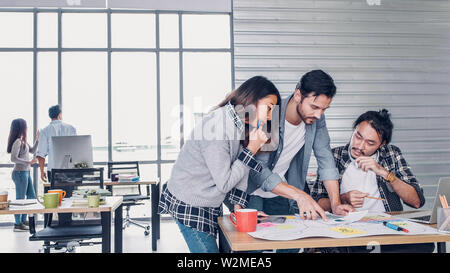Creative designe team brainstrom branding project with designer team at meeting table with desktop computer.discussion idea in creative office Stock Photo