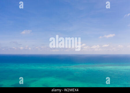 Coral reefs and atolls in the tropical sea, top view. Turquoise sea water and beautiful shallows. Philippine nature. Stock Photo