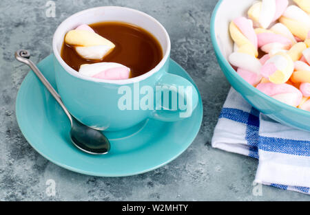 Hot chocolate in blue cup with marshmallows Stock Photo