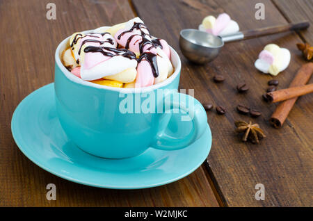 Hot chocolate in blue cup with marshmallows Stock Photo