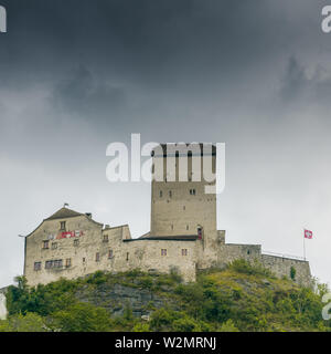 Sargans, SG / Switzerland - 9. July 2019: the historic medieval castle at Sargans in the southeastern Swiss Alps on its grassy hilltop promontory Stock Photo