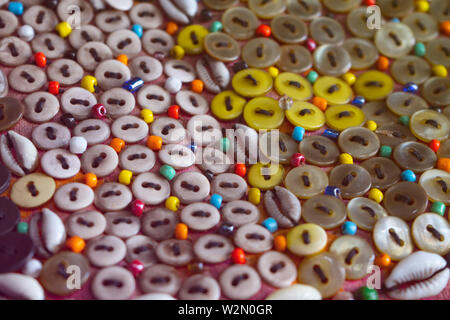 Colored buttons background. Colored vintage clothes buttons. Stock Photo
