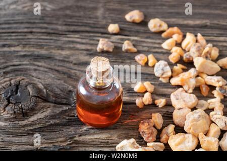A bottle of styrax benzoin essential oil and resin.