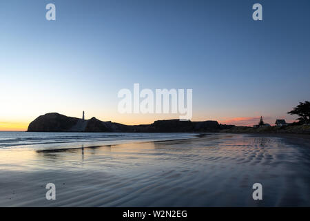 Pre-dawn light over Pacific Ocean at Castlepoint, Wairarapa, North Island, New Zealand Stock Photo