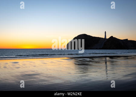 Pre-dawn light over Pacific Ocean at Castlepoint, Wairarapa, North Island, New Zealand Stock Photo