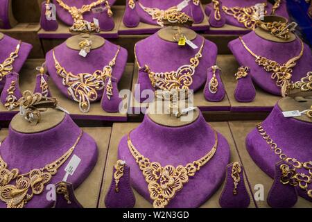 Gold jewellry for sale in the gold markets of the old town souk of Dubai, UAE, Middle East.