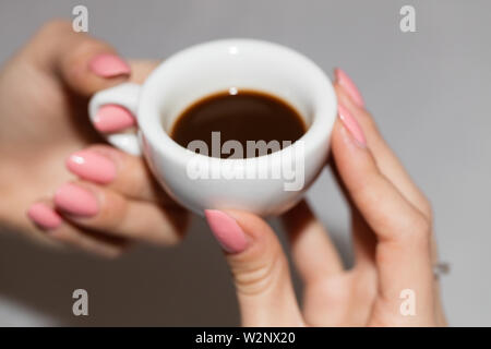 Taking the neapolitan coffee in ceramic cup Stock Photo