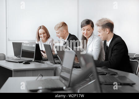 group of Programmers working in the office of the software developer.photo with copy of the poster Stock Photo