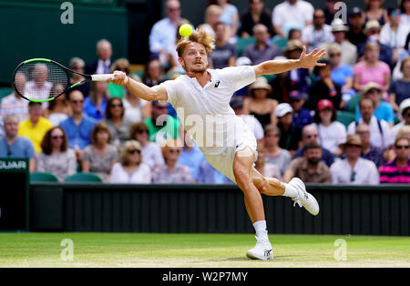 David Goffin in action against Novak Djokovic on day nine of the Wimbledon Championships at the All England Lawn Tennis and Croquet Club, Wimbledon.