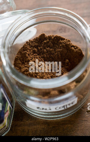 Ground Luwak coffee beans are ready to make coffee in a jar Stock Photo