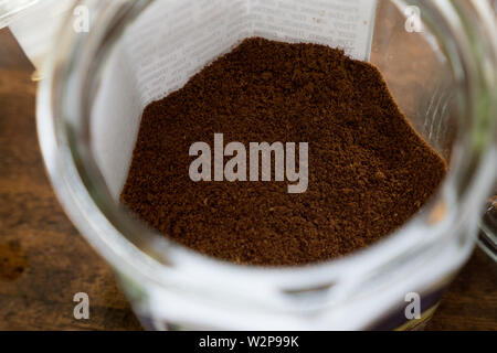 Ground Luwak coffee beans are ready to make coffee in a jar Stock Photo