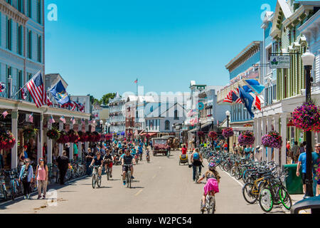 The busy streets of downtown Mackinac Island Michigan Stock Photo