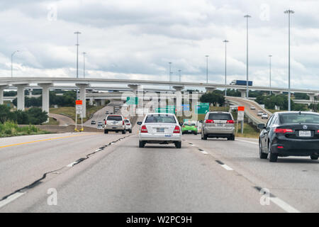 Dallas, USA - June 7, 2019: Interstate highway in city in Texas with many cars on commute Stock Photo