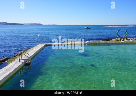 MANLY, AUSTRALIA -15 JUL 2018- View of the Fairy Bower Pool, a triangular rock pool in the Cabbage Tree Bay Aquatic Reserve in Manly on the ocean outs Stock Photo