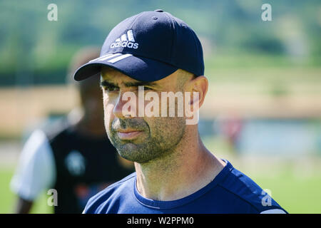 Portrait Cristiano Marques Gomes, nicknamed Cris, the trainer of Mont d'Or Azergues, during training with a cap on his head Stock Photo