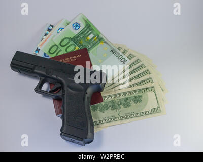 dollars and euro and passport - gangster terrorism Stock Photo