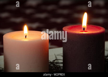 Christmas decoration with beautiful Advent candles. Close up Burning candle. Textured wax Surface. Close up candles Christmas Background concept Stock Photo