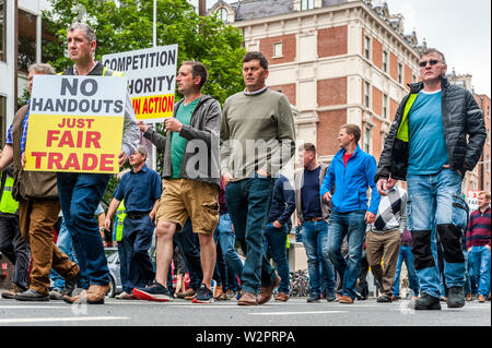 Dublin, Ireland. 10th July, 2019. Thousands of farmers descended on Leinster House today in protest at the Mercosur Deal which farmers claim will be the final nail in the coffin for their way of life. Credit: Andy Gibson/Alamy Live News Stock Photo