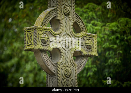 Waddington small picturesque village near Clitheroe in the Ribble Valley, Lancashire,  grade II listed war memorial stone Celtic cross Stock Photo