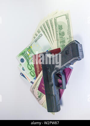 dollars and euro and passport - gangster terrorism Stock Photo