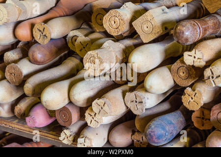 Ship wheel handles in varying stages of manufacture from a wood lathe at the heritage Britannia Ship Yard in Steveston british Columbia Canada Stock Photo