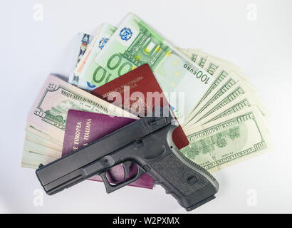 dollars and euro and passport - gangster terrorism Stock Photo