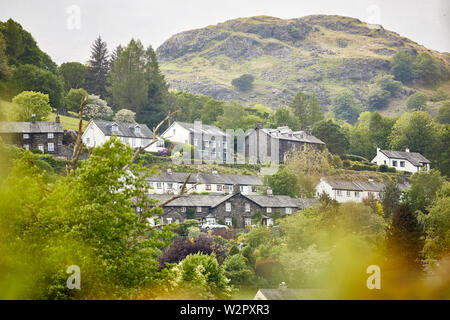 Coniston int he Lake District Cumbria, England, houses at the foot of Coniston Old Man Stock Photo