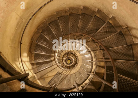 Interesting picture of the spiral staircase at Arc de Triomphe, like a logarithmic spiral of a nautilus shell and of certain snails. A spiral... Stock Photo