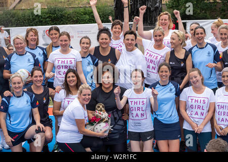 London, UK. 10th July 2019. International Parliamentary Netball competition in Victoria Tower Gardens, played by parliamentary teams representing the UK, New Zealand and Australia. Organised by Netball England ahead of the international netball competition. A team picture, UK in 'This Girl Can' Tshirt, New Zealand in black and Austrian in Blue Credit: Ian Davidson/Alamy Live News Stock Photo
