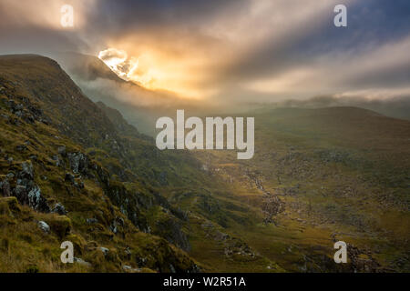 Mount Brandon, Dingle, co. Kerry / Ireland : Spectacular sunset over wild part of Mount Brandon Stock Photo