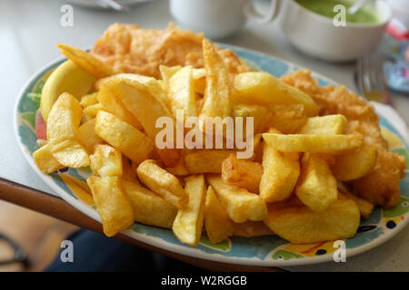 Littlehampton West Sussex UK - Freshly cooked cod fish and chips at a harbourside cafe Stock Photo