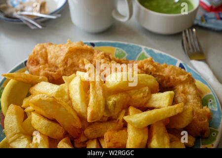Littlehampton West Sussex UK - Freshly cooked cod fish and chips at a harbourside cafe Stock Photo