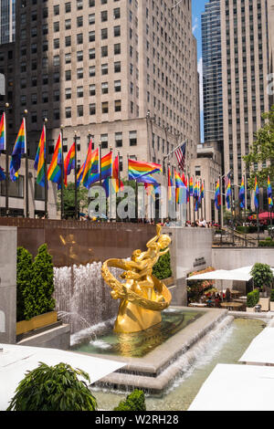 Rainbow color flags celebrate WorldPride at Rockefeller Center Plaza, NYC, USA