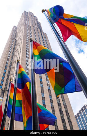 Rainbow color flags celebrate WorldPride at Rockefeller Center Plaza, NYC, USA