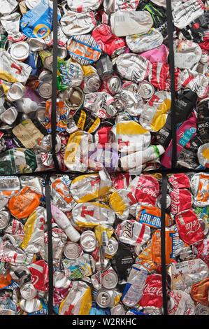 Crushed aluminium cans for processing at a recycling plant Stock Photo