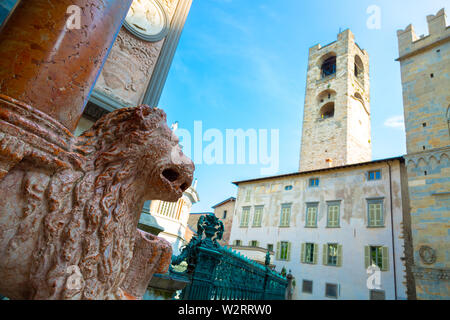 Lion sculpture in front of the church in Old Town of Bergamo city, Italy Stock Photo