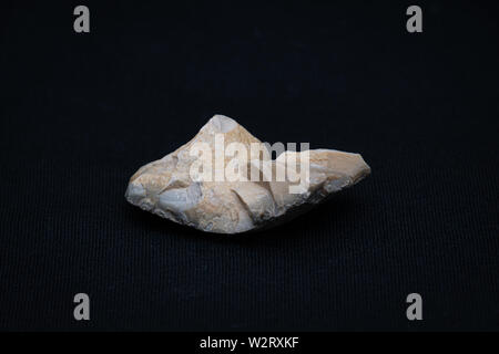 Piece of big flint broken apart and forming sharp edges for stone age ...