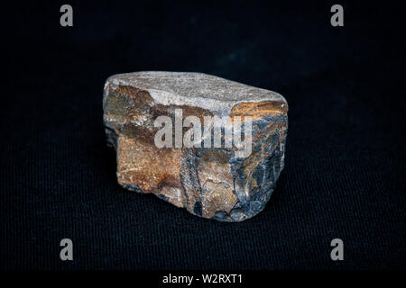 Muskovit gemstone containing high concentration of iron ore Stock Photo