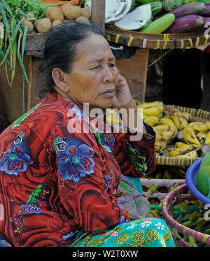 surabaya, jawa timur/indonesia - november 10, 2009: a street market sales woman at a market on  jalan kebalen timur Stock Photo