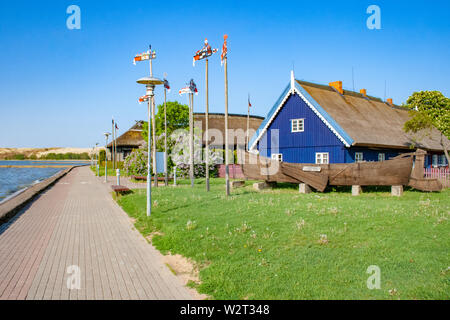 Traditional fishermen's houses in Nida, Lithuania, Europe. Resort town in Lithuania. Located on the Curonian Spit between the Curonian Lagoon Stock Photo